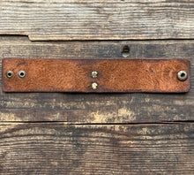 Load image into Gallery viewer, Egyptian Revival Brass Lotus and Snake Design on Leather Bracelet, Set with Garnet in Fine Silver