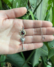 Load image into Gallery viewer, Symbolic Key and Heart Pendant, Sterling and Brass with Faceted Garnet, 16” Sterling Chain
